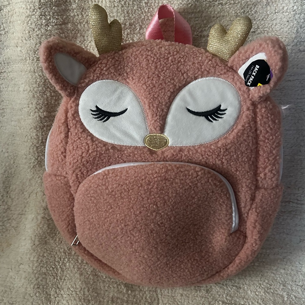 New deer back back, sweet pink w sleepy eyelashes. Ready to be loved by someone